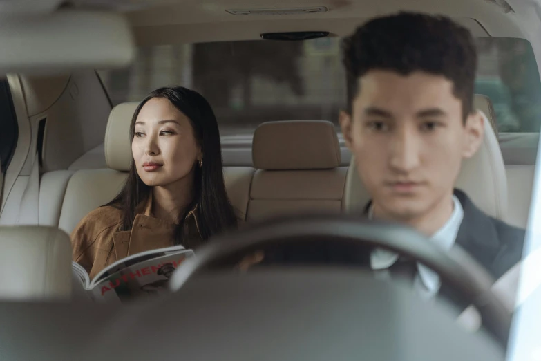 a man and a woman sitting in a car, ryan jia, at netflix, high resolution image, worried