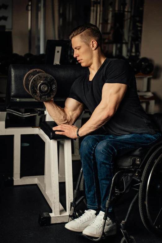 a man in a wheelchair lifting a barbell, an album cover, trending on pexels, depressed dramatic bicep pose, a handsome, sitting, cas