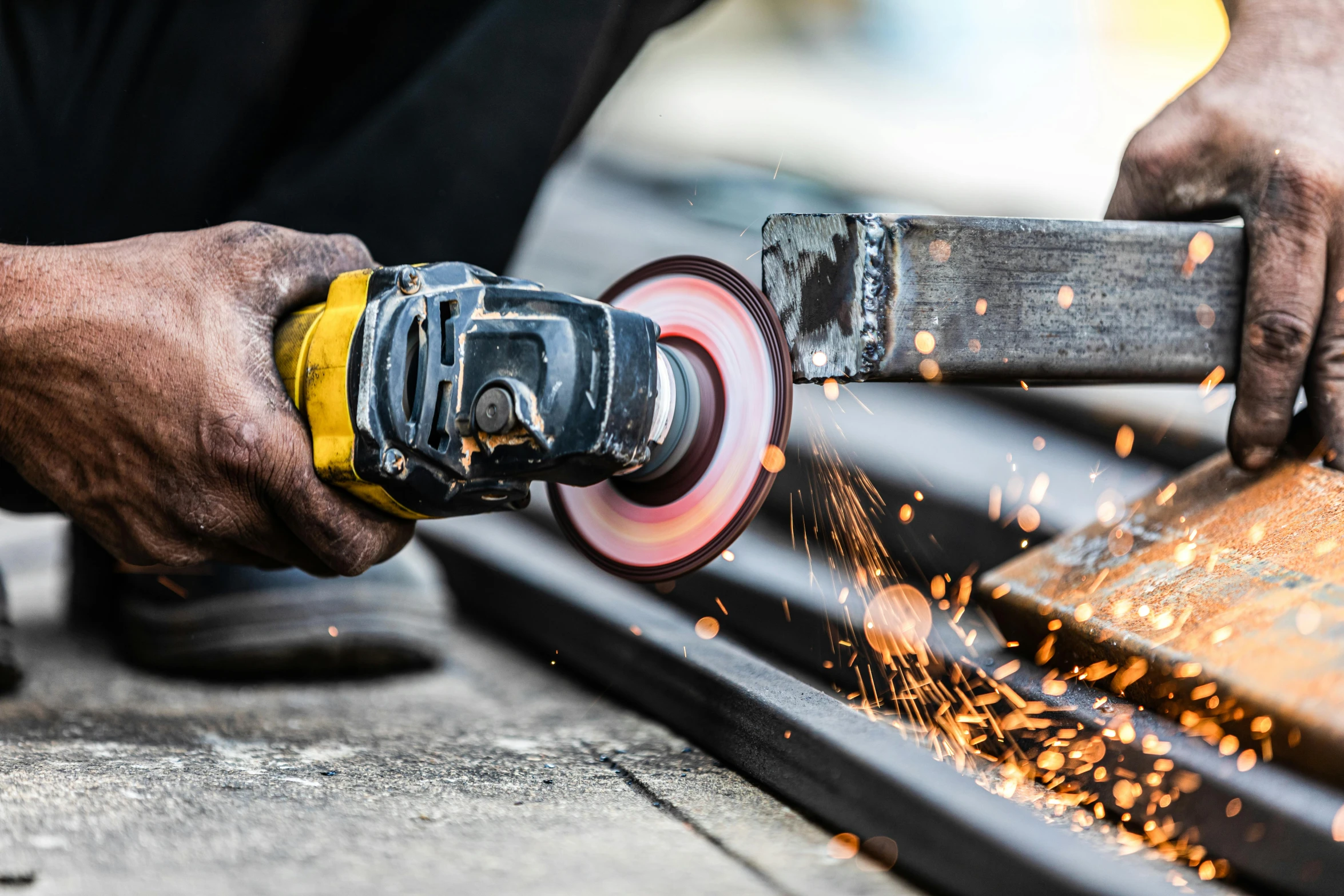 a man grinding a piece of wood with a grinder, by Matthias Stom, pexels contest winner, arbeitsrat für kunst, steel plating, avatar image, islamic, close-up photo