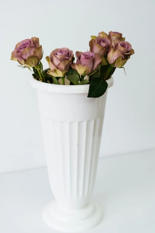 a white vase with pink roses in it, paper cup, detailed product shot, tall, cast