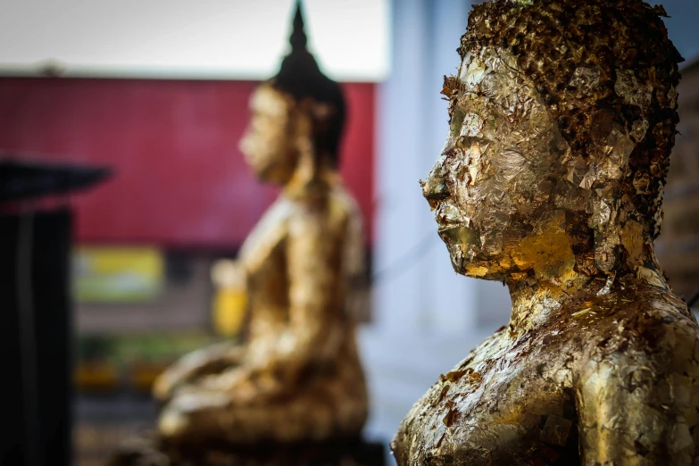 a couple of statues sitting next to each other, pexels contest winner, thailand, avatar image, gold leaf, thumbnail