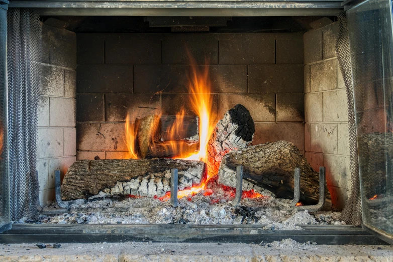 a close up of a fire in a fireplace, pexels contest winner, cold sunny weather, panels, profile image, ready to eat