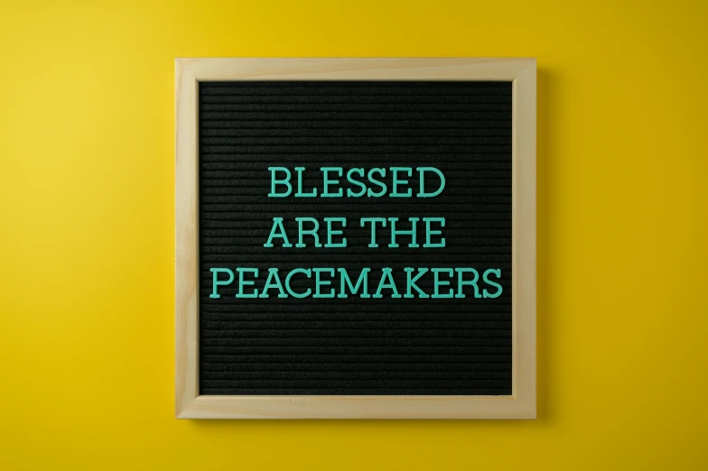 a sign that says blessed are the peacemakers, pexels, folk art, blotter art, 1 6 x 1 6, pessimism, speakers