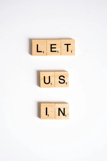 scrabbles spelling let us in on a white background, unsplash, letterism, houdini, 🎨🖌️, leader, situation