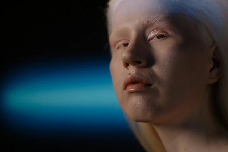 a close up of a person with white hair, a hologram, inspired by Vanessa Beecroft, trending on pexels, albino dwarf, still frame from prometheus, face looking skyward, hyperrealistic teen