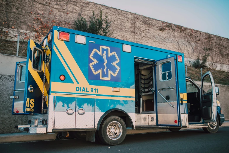 an ambulance is parked on the side of the road, a portrait, by Meredith Dillman, pexels, blue, 🚿🗝📝