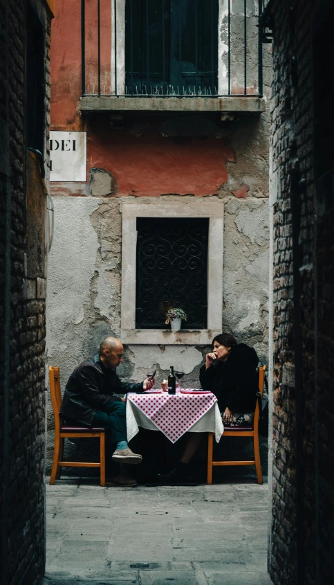 two men sitting at a table in an alley, a photo, pexels contest winner, renaissance, restaurant menu photo, man and woman, venice, 15081959 21121991 01012000 4k