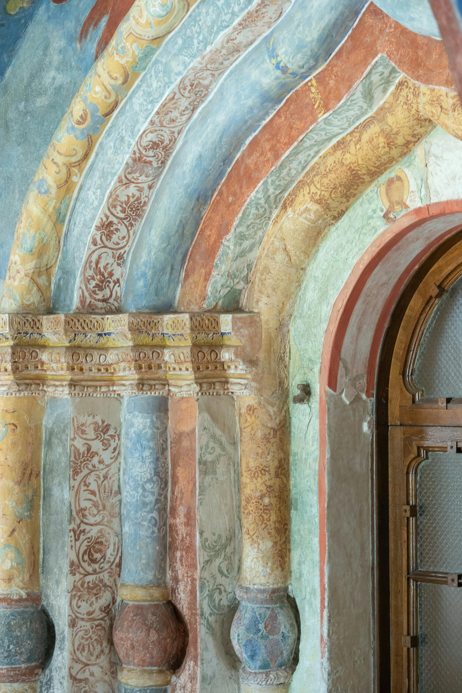 a painting on the side of a building, inspired by Károly Markó the Elder, trending on unsplash, romanesque, church interior, nordic pastel colors, high texture detail), an archway