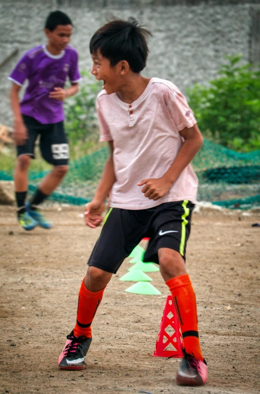 a group of young men playing a game of soccer, dribble, happening, he is at camp, sassy pose, asher duran, taken in 2 0 2 0