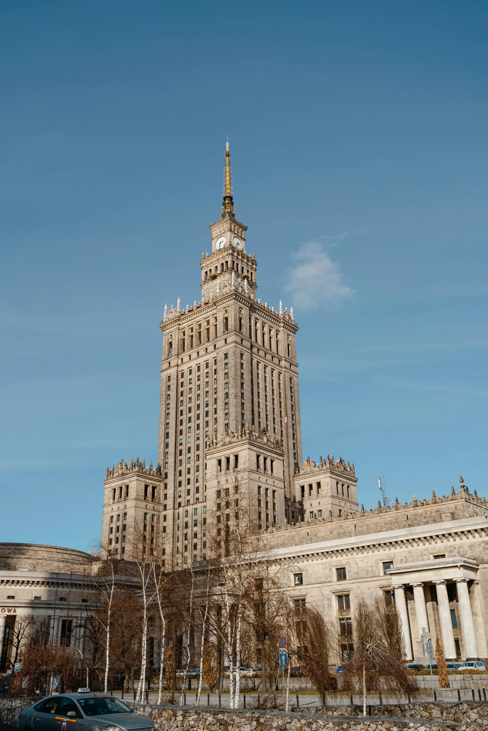 a very tall building with a clock on top of it, inspired by Władysław Malecki, unsplash contest winner, socialist realism, monumental giant palace, panorama, square, b - roll