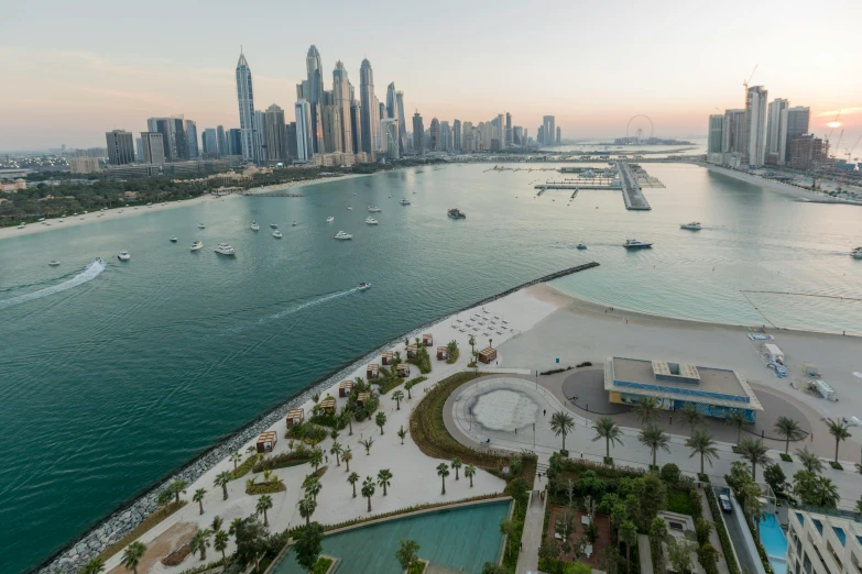 a large body of water next to a city, by Edmund Greacen, pexels contest winner, happening, gta : dubai, parks and public space, foster and partners, wide high angle view