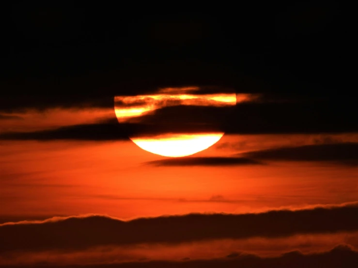 the sun is setting in the dark sky, by Ian Fairweather, pexels contest winner, digital yellow red sun, eclipse, shutter, ((sunset))