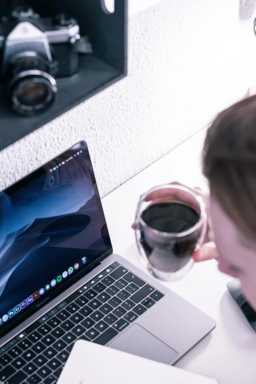 a woman sitting in front of a laptop computer, a computer rendering, by Sebastian Vrancx, pexels contest winner, cold brew coffee ), subreddit / r / whale, close up to the screen, connectivity