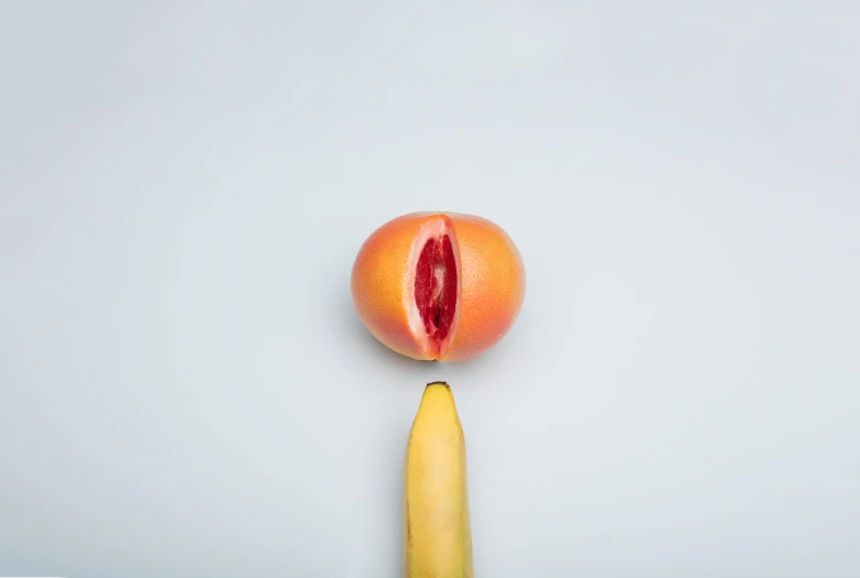 a ripe peach sitting on top of a banana, by Jan Rustem, unsplash, hyperrealism, cervix awakening, made of flesh and muscles, spoon placed, 35 mm product photo”