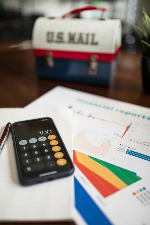 a cell phone sitting on top of a table, a cartoon, unsplash, private press, red blue and gold color scheme, mathematics, documents, sharp focus »