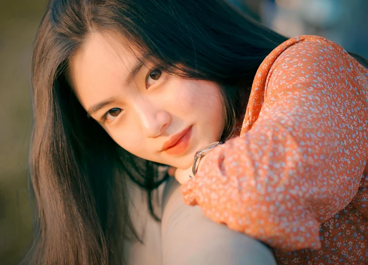 a close up of a woman with long hair, a picture, inspired by Kim Jeong-hui, trending on pexels, iu, peach, woman posing, warmly lit