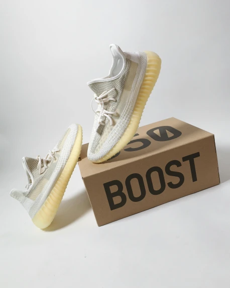 a pair of white sneakers sitting on top of a box, a picture, 🐎🍑, yzy, full body shot hyperdetailed, booster