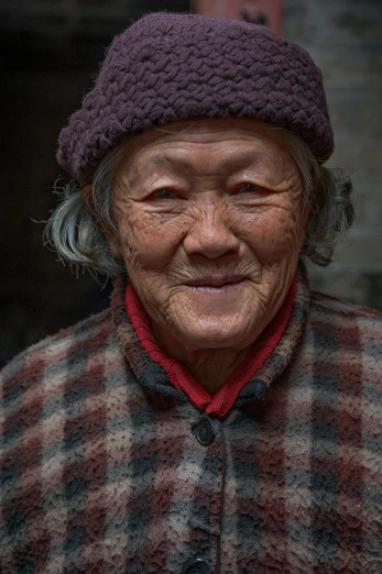 a close up of a person wearing a hat, a character portrait, pexels contest winner, cloisonnism, portrait of rugged adult female, hou china, paul barson, by greg rutkowski