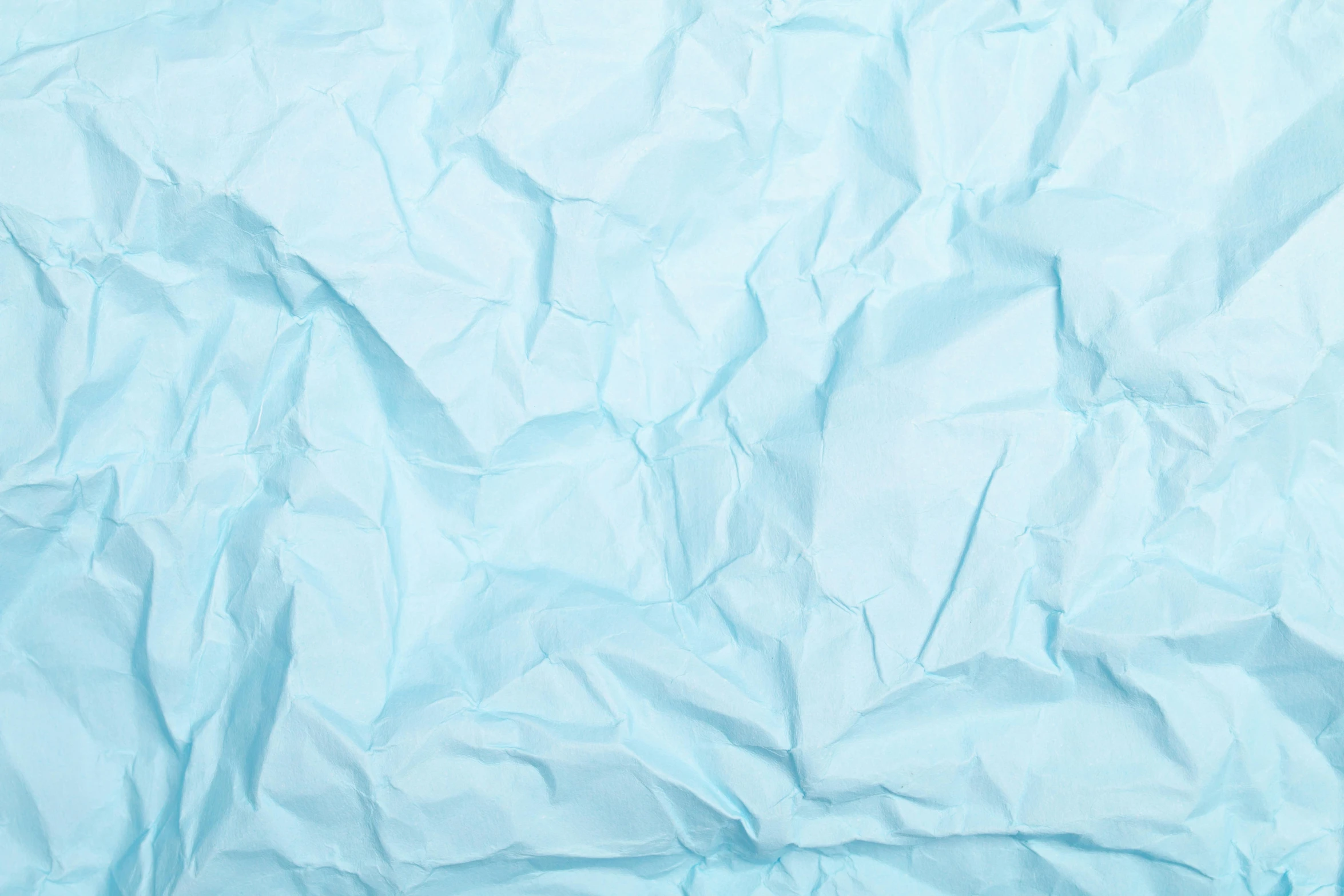 a close up of a sheet of blue paper, by Helen Stevenson, pexels contest winner, wrinkles, creamy, hyper realistic, 15081959 21121991 01012000 4k