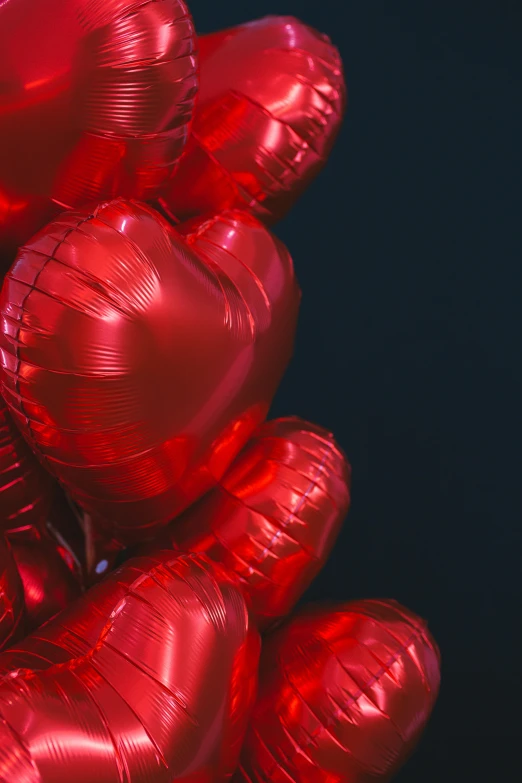 a bunch of shiny red heart shaped balloons, pexels, photorealism, metallic reflective, paul barson, slide show, lgbtq