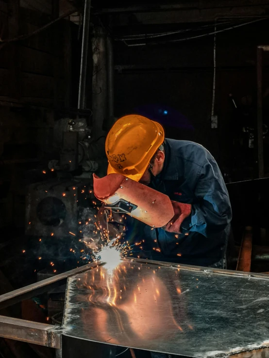 a man in a hard hat welding metal, a portrait, pexels contest winner, thumbnail, background image, shot on iphone 6, epic scene