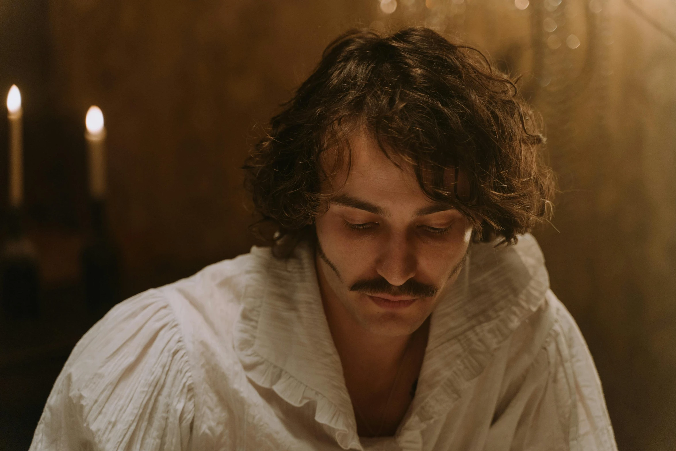 a close up of a person in a bathrobe, an album cover, inspired by Jules Robert Auguste, trending on pexels, rococo, robert sheehan, mihaly munkacsy, moustache, dimly lit scene