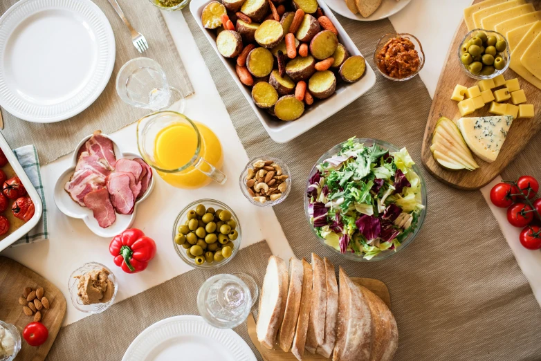 a table that has a lot of food on it, by Carey Morris, pexels contest winner, full body shot close up, full daylight, epicurious, thumbnail