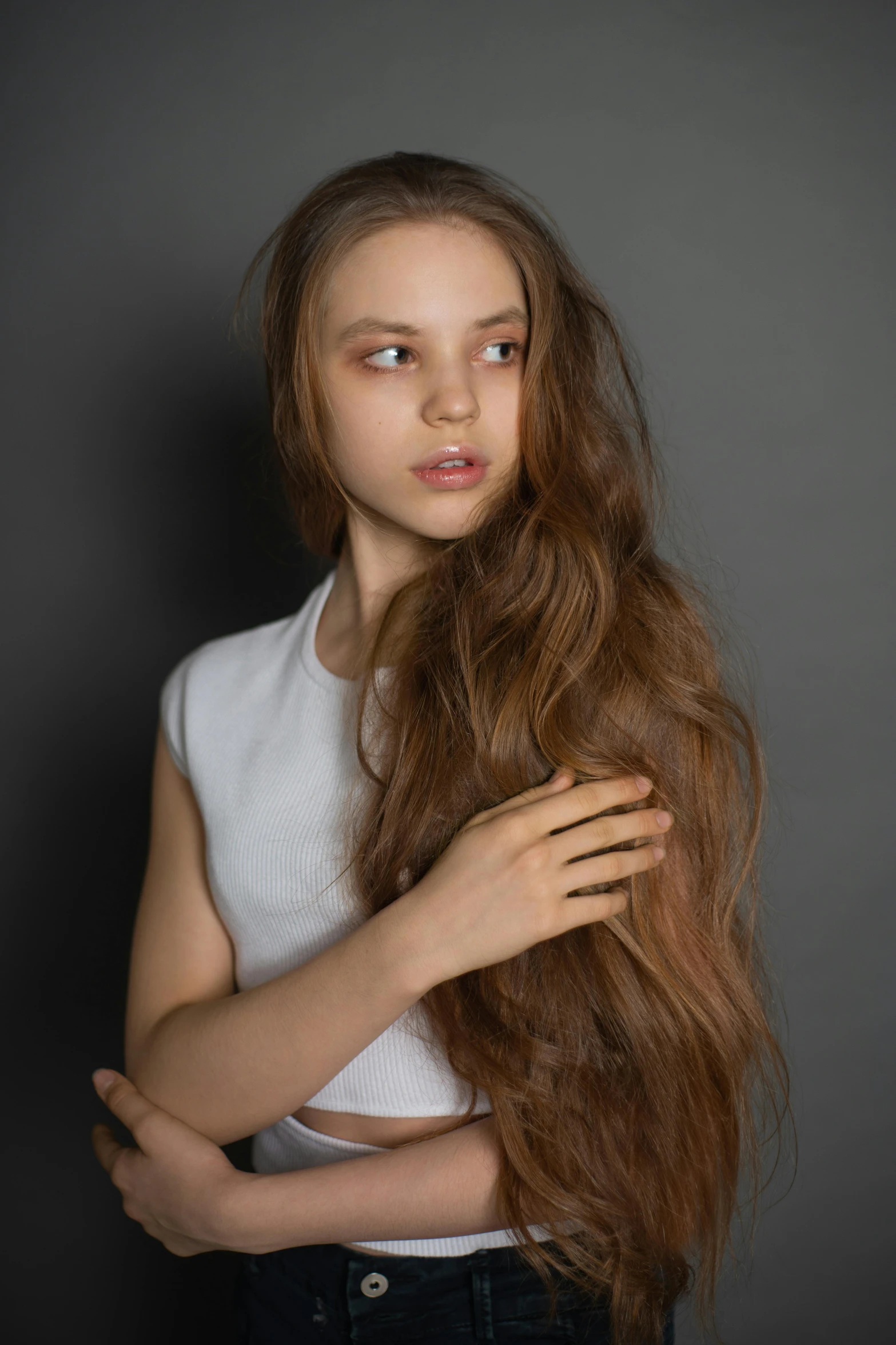 a girl with long brown hair posing for a picture, by irakli nadar, loosely cropped, high quality image, half - length photo