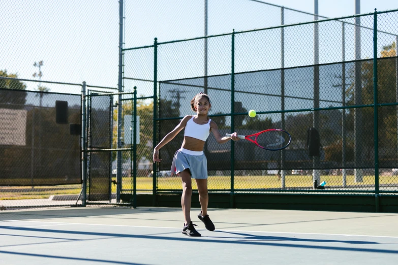 a woman swinging a tennis racquet on a tennis court, square, shot with canon 5 d mark ii, schools, ayne haag