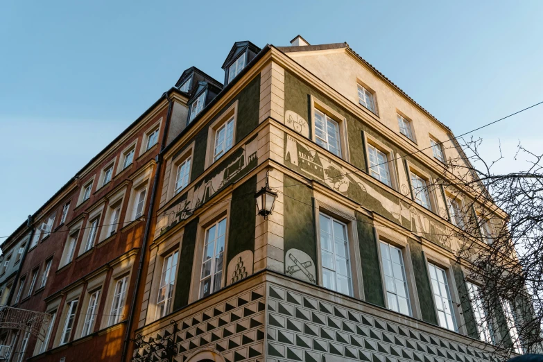 a tall building with a clock on the side of it, by Adam Marczyński, pexels contest winner, art nouveau, sunlight and whimsical houses, square, 1792, profile image