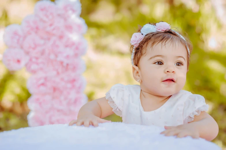 a baby girl in a white dress and a pink teddy bear, an album cover, by Lilia Alvarado, pexels contest winner, cotton candy bushes, lovingly looking at camera, pink headband, panels