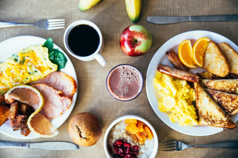 a table topped with plates of food and a cup of coffee, pexels contest winner, breakfast, body breaking apart, fruit, profile image