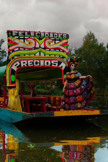 a colorful boat on a body of water, la catrina, special effects, colorful signs, slide show