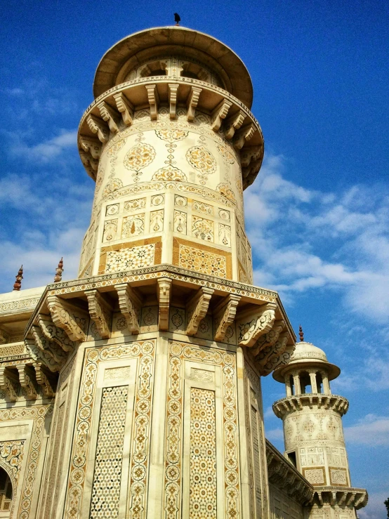 a close up of a building with a sky background, a mosaic, arabesque, taj mahal, shades of gold display naturally, profile pic, watch tower