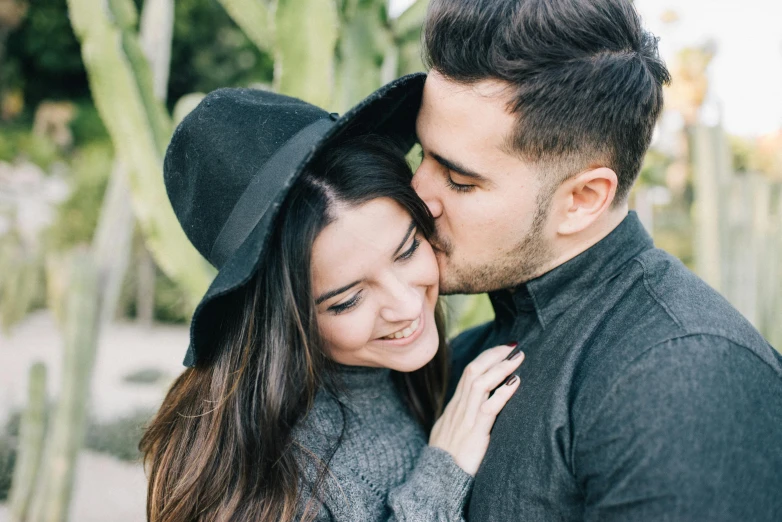 a man and a woman standing next to each other, pexels contest winner, kissing smile, pokimane, headshot, correct details