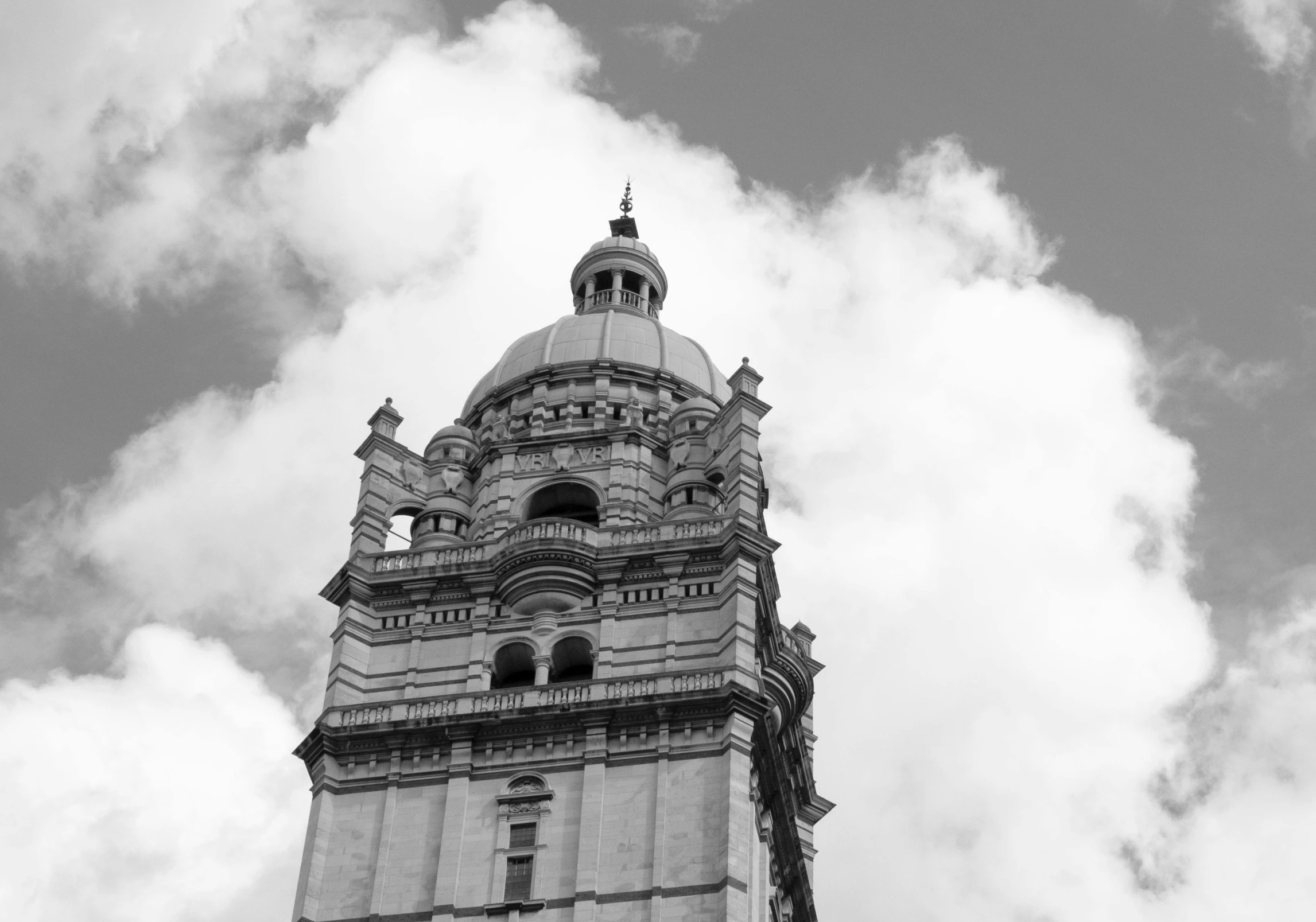 a black and white photo of a clock tower, a black and white photo, inspired by Canaletto, pexels contest winner, baroque, monserrat gudiol, neoclassical tower with dome, bright sky, high details photo