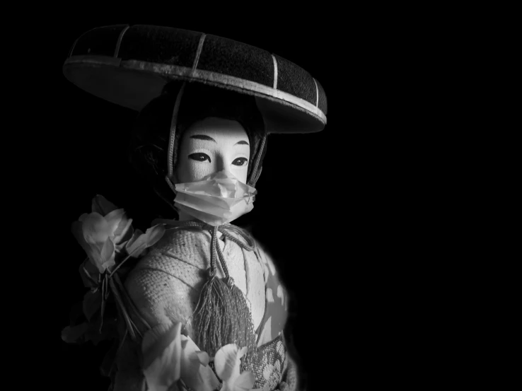 a black and white photo of a woman with a mask on, a black and white photo, inspired by Kanō Naizen, several dolls in one photo, feudal japan art, trending photo, character with a hat