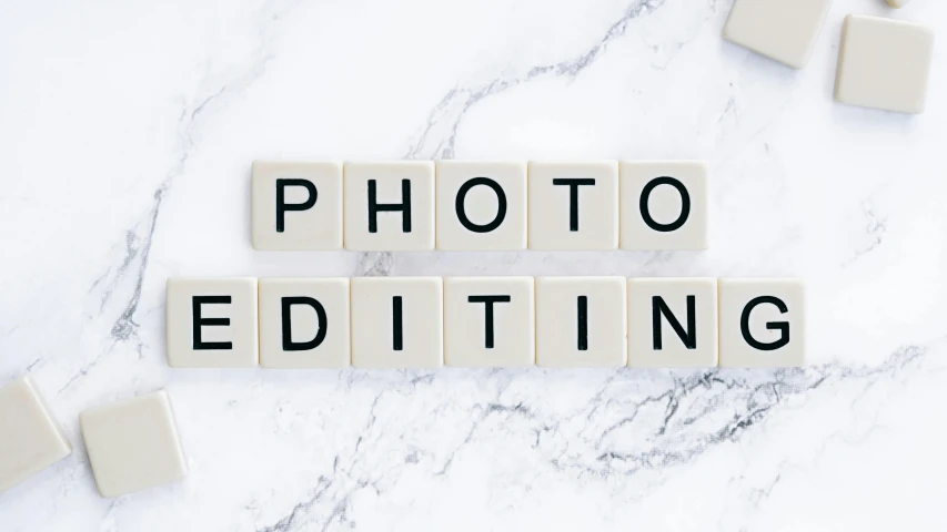 the words photo editing spelled in scrabbles on a marble surface, a photo, trending on pexels, professional wedding photography, pr shoot, phot, no cropping