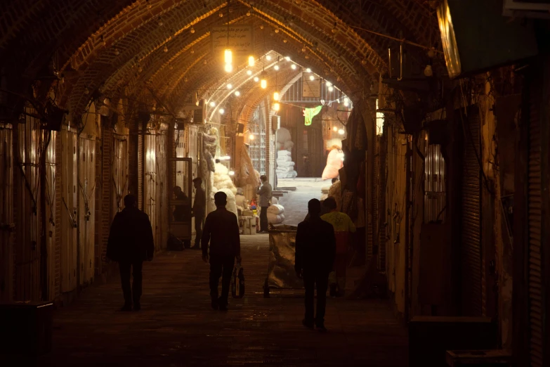 a group of people walking down a street at night, dry archways, sayem reza, fan favorite, fish market