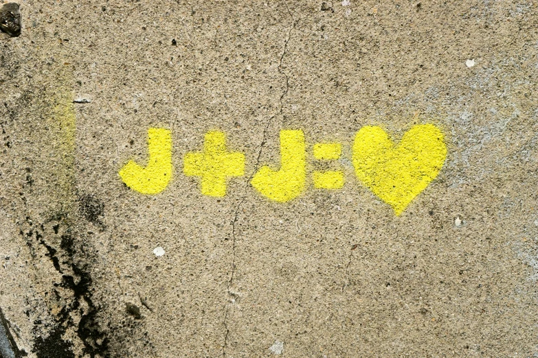 a yellow spray painted sign sitting on the side of a road, chalk art, inspired by Jim Dine, unsplash, graffiti, “jeffrey” logo, hearts, jjba, けもの