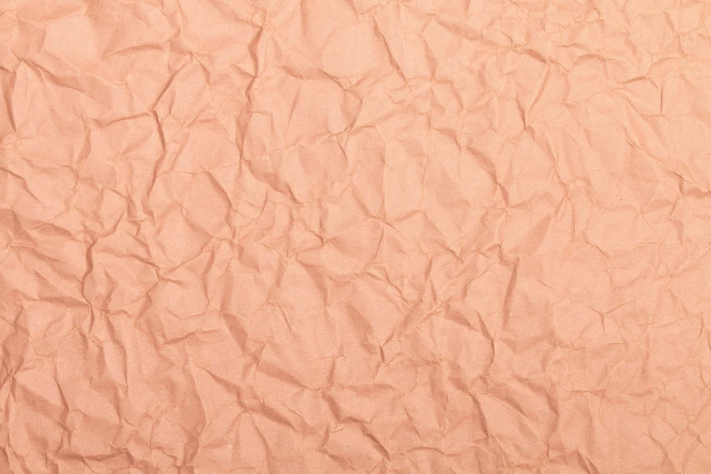 a close up of a sheet of brown paper, trending on pexels, covered in pink flesh, epicanthal fold, orange, metallic