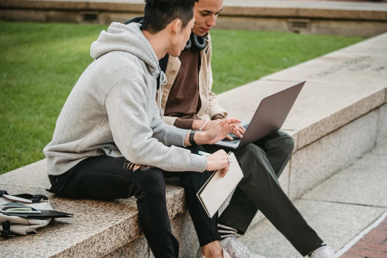 a couple of men sitting next to each other on a bench, trending on pexels, typing on laptop, university, sydney park, avatar image