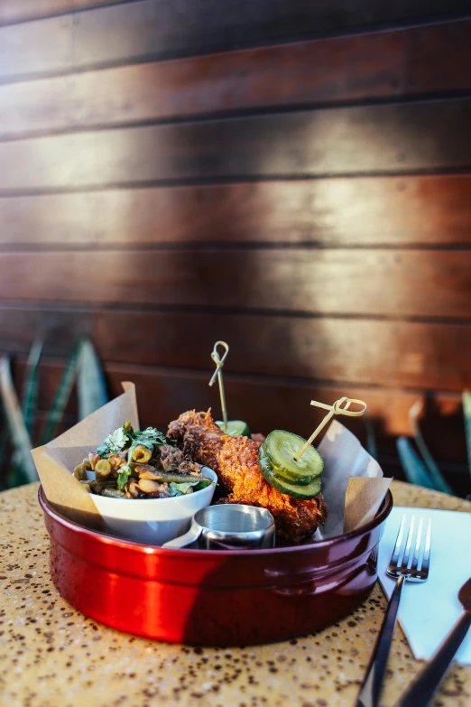 a tray of food sitting on top of a table, by Jessie Algie, fried chicken, patio, no blur, bowl