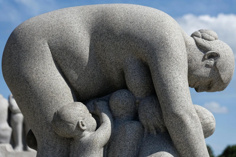 a statue of a woman holding a baby, by Eero Järnefelt, pexels contest winner, figuration libre, pile of bodies, granite, heavily stylized, norway