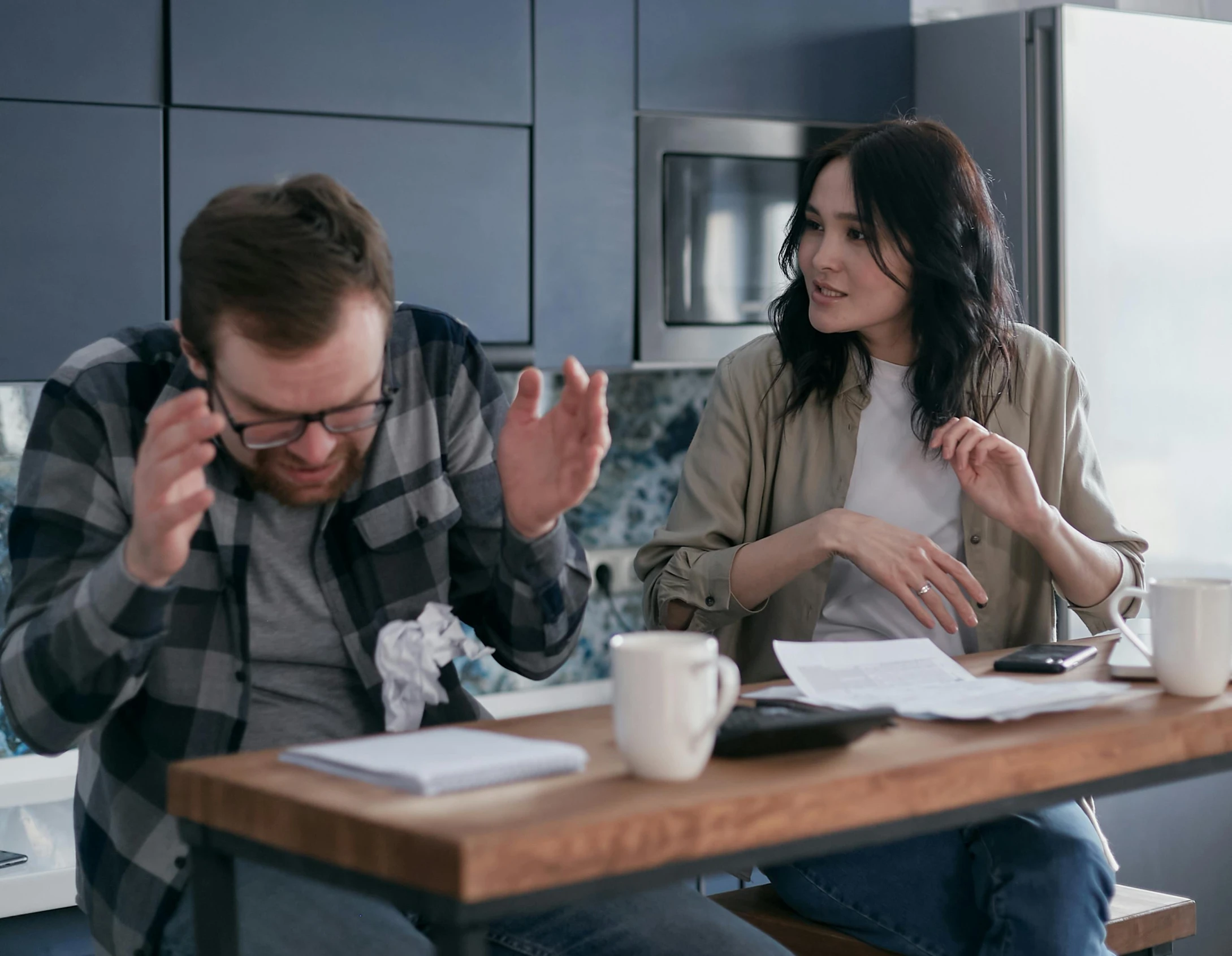 a couple of people that are sitting at a table, pexels, arguing, te pae, maintenance, realistic »