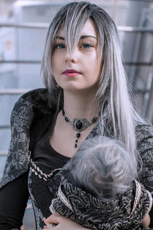 a woman holding a baby in her arms, a character portrait, reddit, gothic art, silver hair (ponytail), cosplay photo, mall goth, elden ring inspired