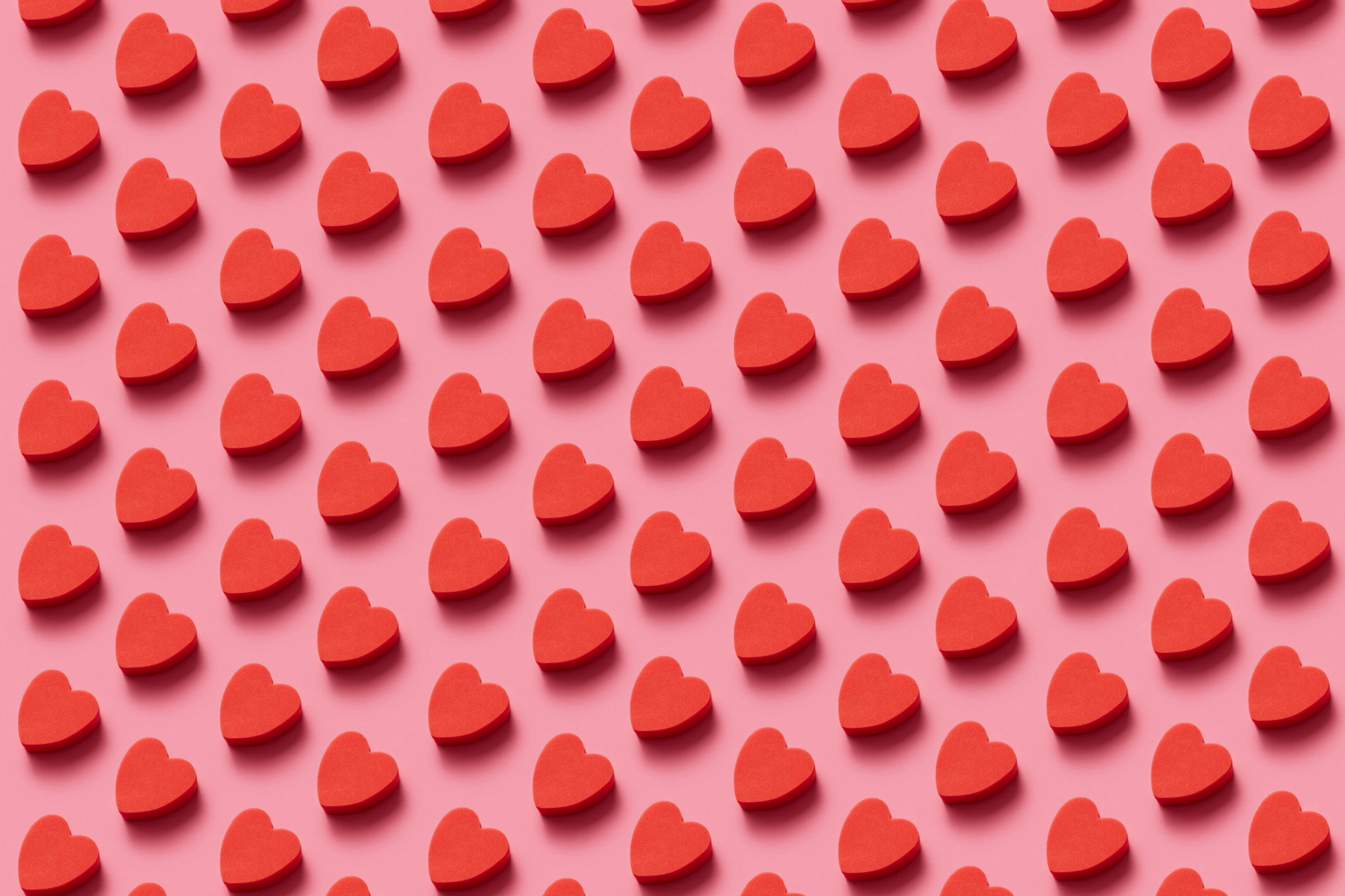 a lot of red hearts on a pink background, trending on pexels, tessellation, candy treatments, dating app icon, ad image