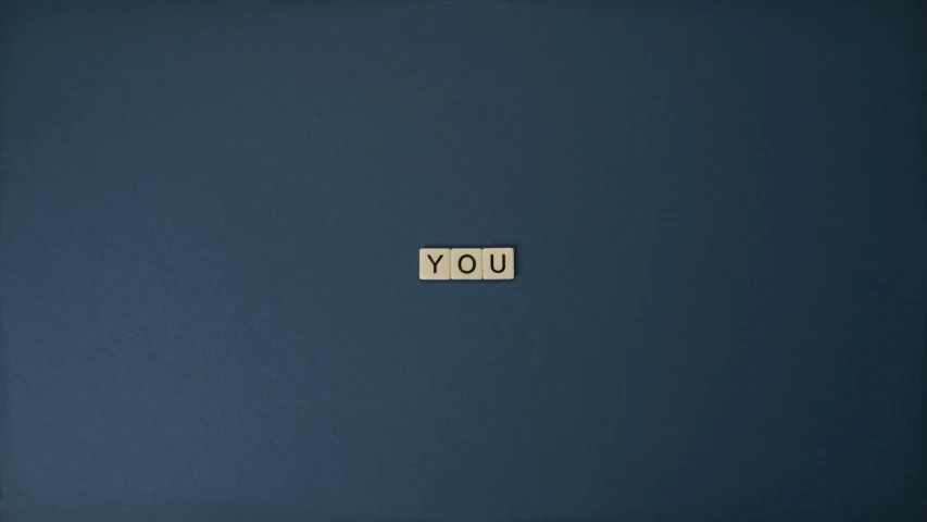 a laptop computer sitting on top of a desk, an album cover, inspired by Ian Hamilton Finlay, me and you, dark blue background, yo, high resolution image