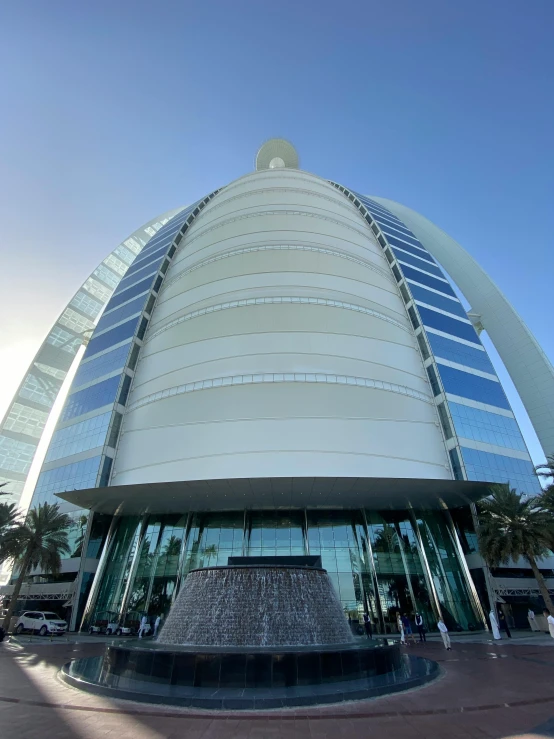 a building with a fountain in front of it, dubai, giant glass dome in space, thumbnail, no watermark