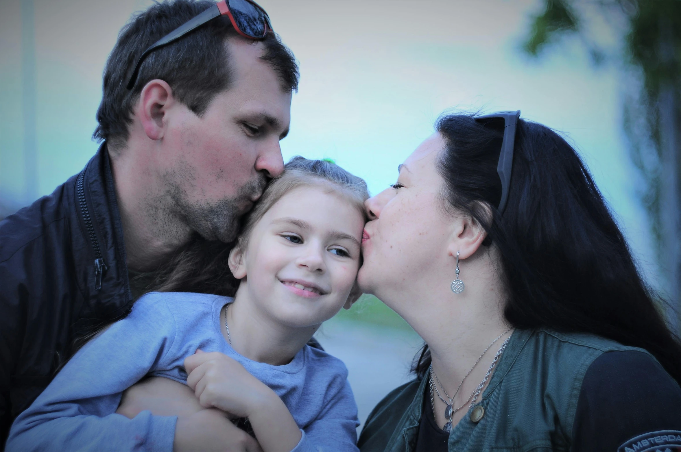 a man kissing a woman and a little girl, a picture, avatar image, lynn skordal, high quality image, medium shoot